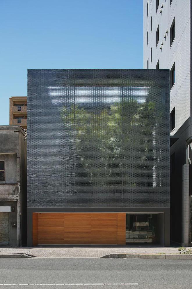 这住宅用了6000块玻璃砖打造的外墙竟然变成了城市里的风景画！(图2)